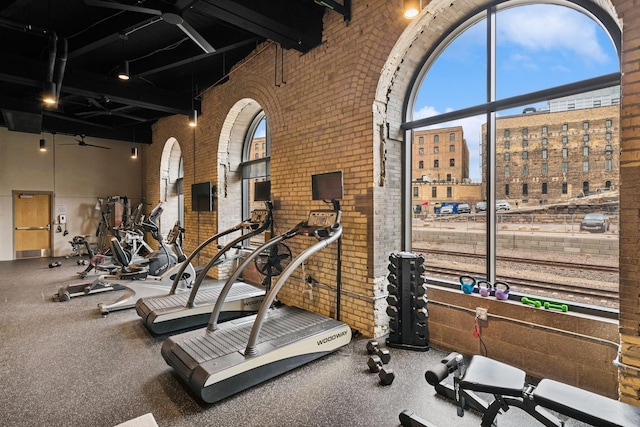 404 Washington Ave N Unit 504, Minneapolis, MN 55401 - gym featuring brick wall and a high ceiling