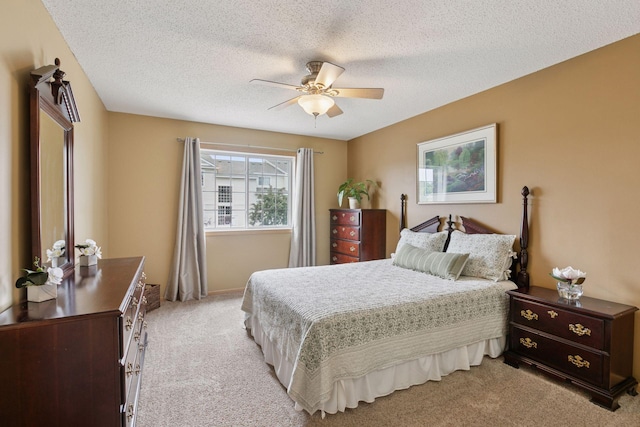 17829 66th Ave N, Maple Grove, MN 55311 - bedroom with light carpet, a textured ceiling, and a ceiling fan