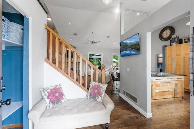 1439 Oakdale Ave W, Saint Paul, MN 55118 - foyer entrance featuring wood finished floors, track lighting, a ceiling fan, stairs, and baseboards
