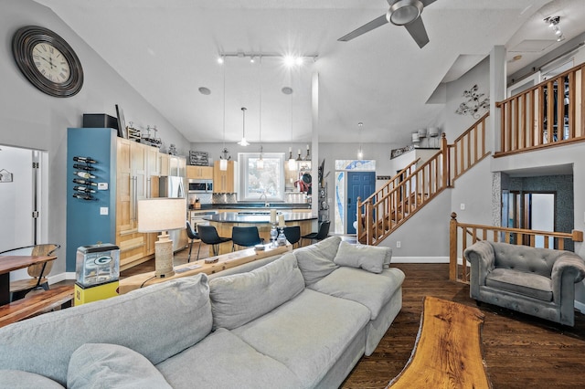 1439 Oakdale Ave W, Saint Paul, MN 55118 - living area featuring dark wood-type flooring, ceiling fan, baseboards, stairway, and track lighting