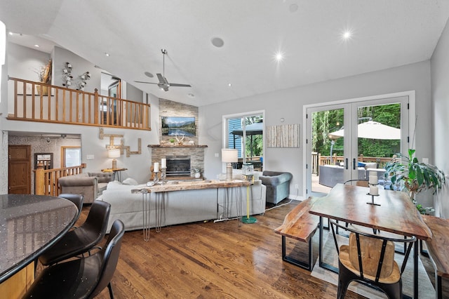 1439 Oakdale Ave W, Saint Paul, MN 55118 - living room with ceiling fan, vaulted ceiling, wood finished floors, a fireplace, and french doors