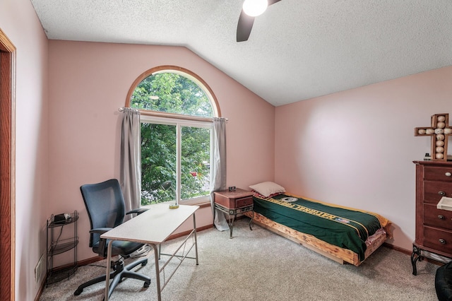 1439 Oakdale Ave W, Saint Paul, MN 55118 - carpeted bedroom featuring vaulted ceiling, a ceiling fan, a desk, a textured ceiling, and baseboards