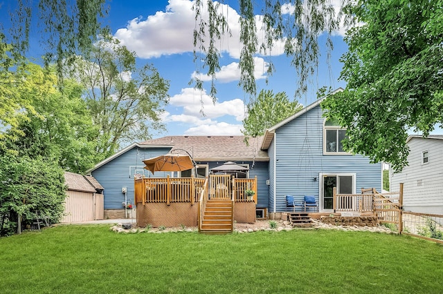 1439 Oakdale Ave W, Saint Paul, MN 55118 - rear view of house with a deck and a lawn