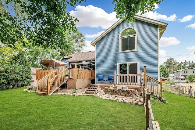 1439 Oakdale Ave W, Saint Paul, MN 55118 - rear view of property with stairs and a wooden deck