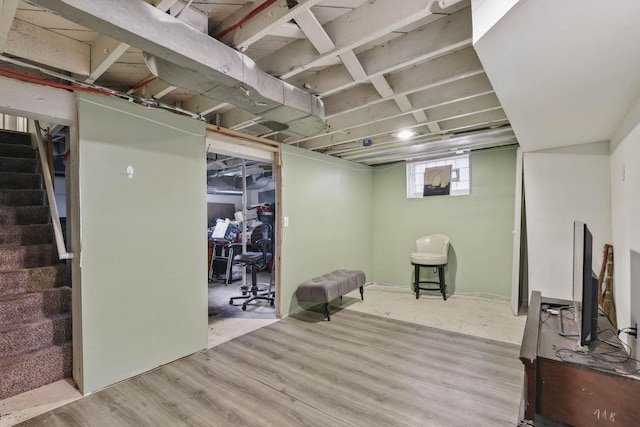 3314 Aldrich Ave N, Minneapolis, MN 55412 - basement featuring stairs and wood finished floors