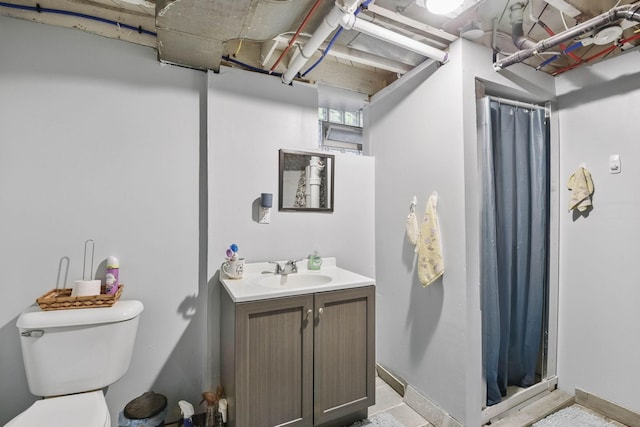 3314 Aldrich Ave N, Minneapolis, MN 55412 - full bathroom featuring vanity, toilet, a shower stall, and baseboards