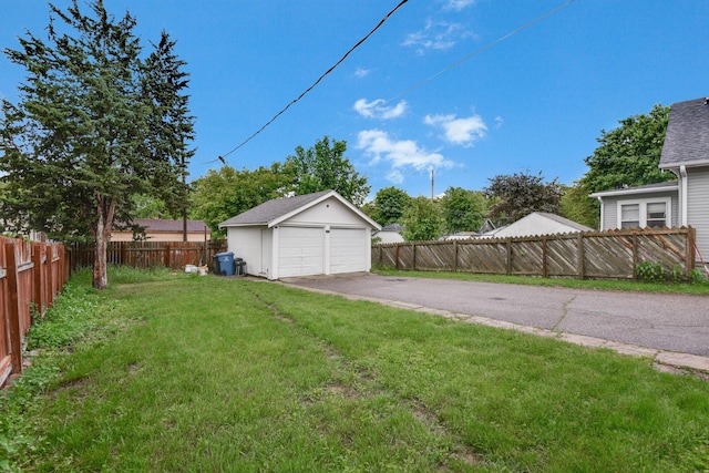 3314 Aldrich Ave N, Minneapolis, MN 55412 - view of yard featuring a garage and an outbuilding