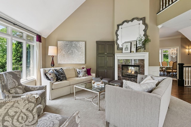 9320 Abigail Ct, Inver Grove Heights, MN 55077 - living room with high vaulted ceiling, a fireplace, crown molding, wood finished floors, and a wainscoted wall
