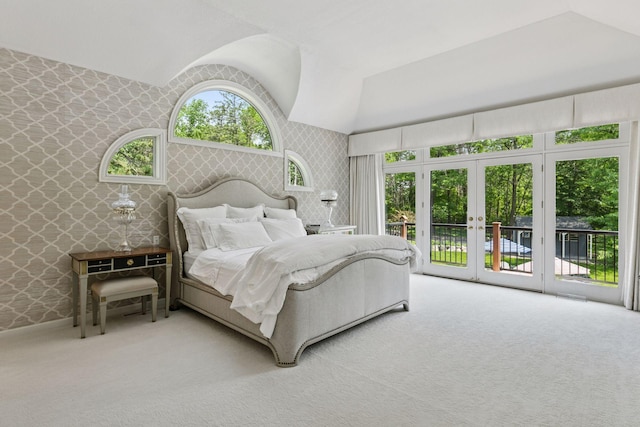9320 Abigail Ct, Inver Grove Heights, MN 55077 - carpeted bedroom featuring lofted ceiling, wallpapered walls, access to outside, and french doors