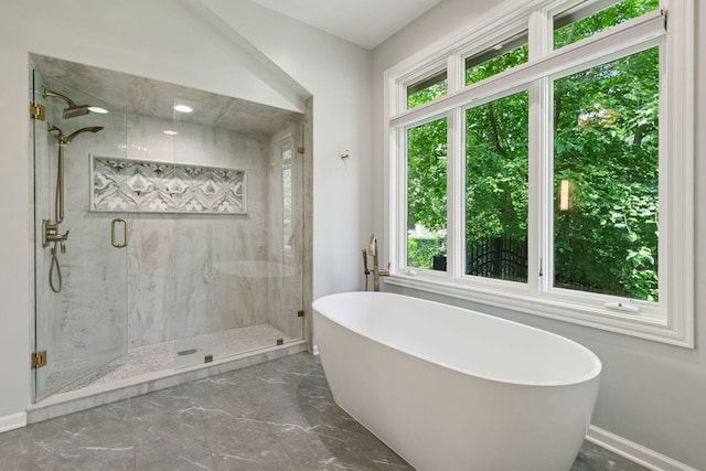 9320 Abigail Ct, Inver Grove Heights, MN 55077 - bathroom with plenty of natural light, a soaking tub, a marble finish shower, and marble tiled floors
