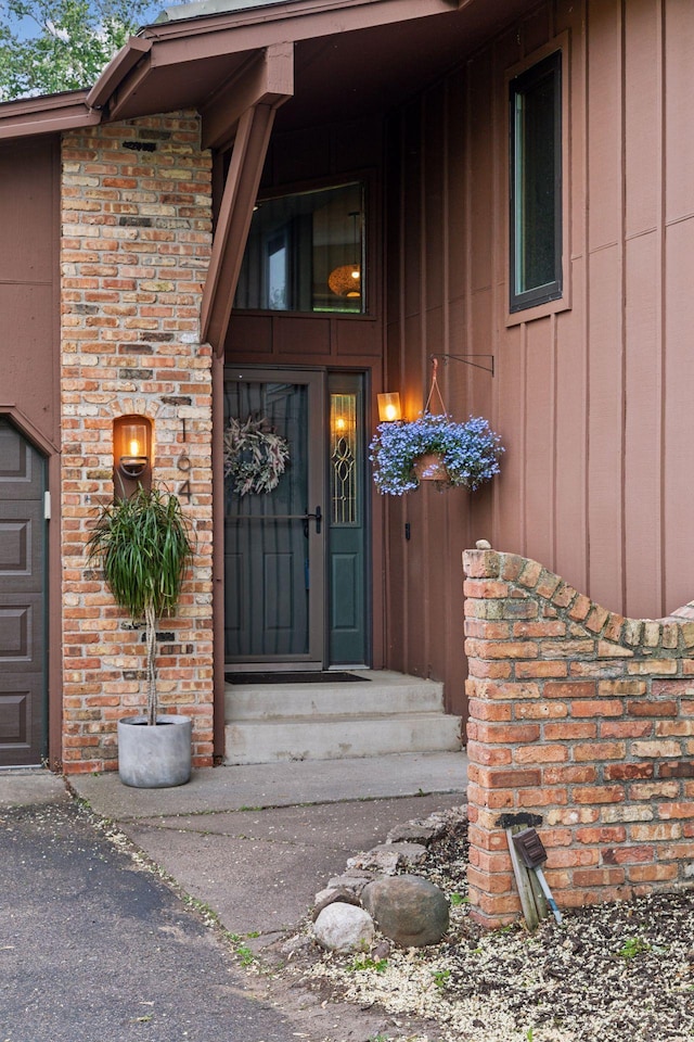 164 Wendy Ct, Shoreview, MN 55126 - property entrance featuring board and batten siding and brick siding