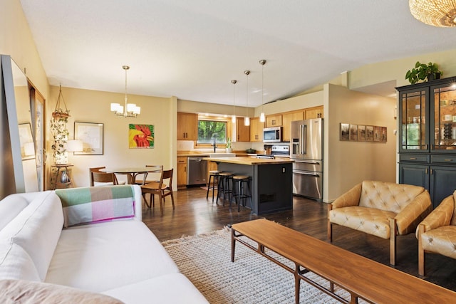 164 Wendy Ct, Shoreview, MN 55126 - living area featuring dark wood-style floors, lofted ceiling, and a chandelier