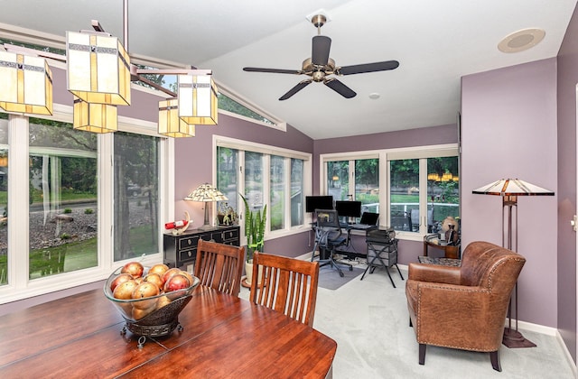 706 Pershing Ave N, New Prague, MN 56071 - carpeted dining space featuring lofted ceiling, a desk, a ceiling fan, and baseboards