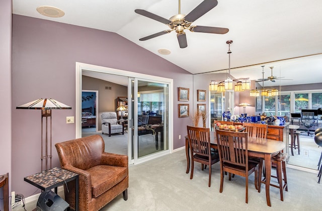 706 Pershing Ave N, New Prague, MN 56071 - dining space with a ceiling fan, vaulted ceiling, light colored carpet, and baseboards