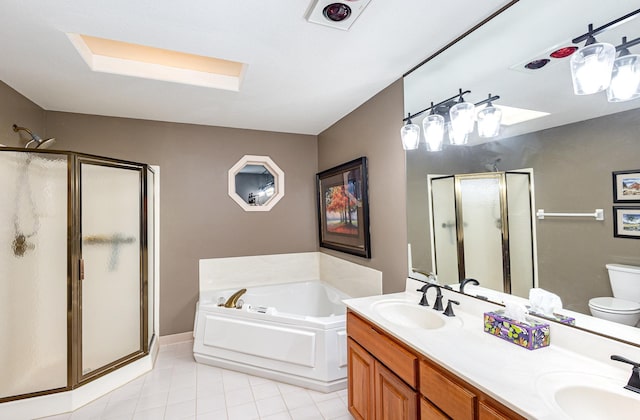 706 Pershing Ave N, New Prague, MN 56071 - full bathroom featuring a shower stall, a garden tub, toilet, tile patterned flooring, and double vanity
