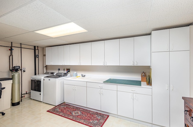 706 Pershing Ave N, New Prague, MN 56071 - washroom featuring independent washer and dryer and cabinet space