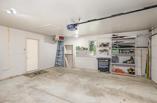 706 Pershing Ave N, New Prague, MN 56071 - garage featuring a garage door opener