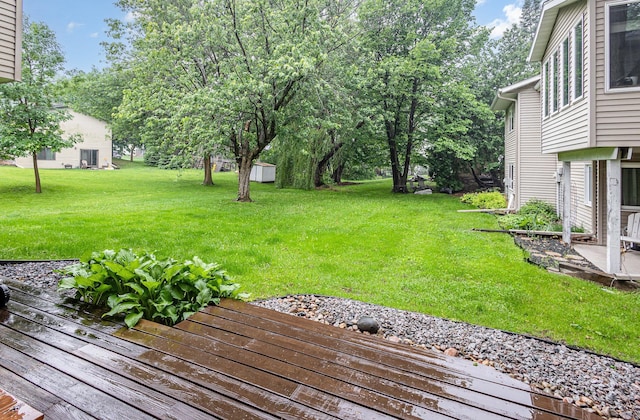 706 Pershing Ave N, New Prague, MN 56071 - view of green lawn with a wooden deck
