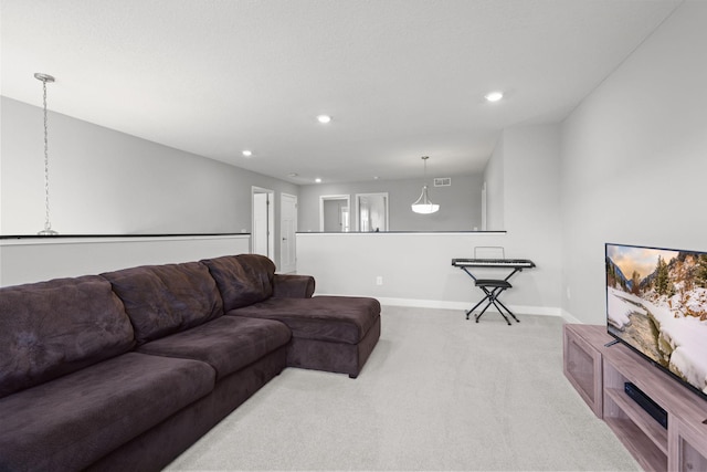 12946 Jewell Cir, Blaine, MN 55449 - carpeted living area featuring baseboards and recessed lighting