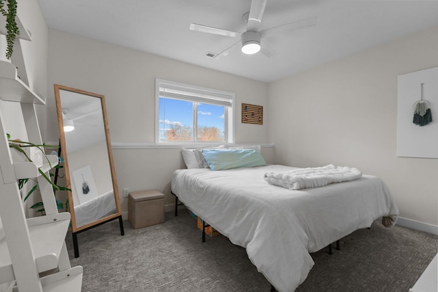 12946 Jewell Cir, Blaine, MN 55449 - bedroom featuring carpet floors, a ceiling fan, and baseboards
