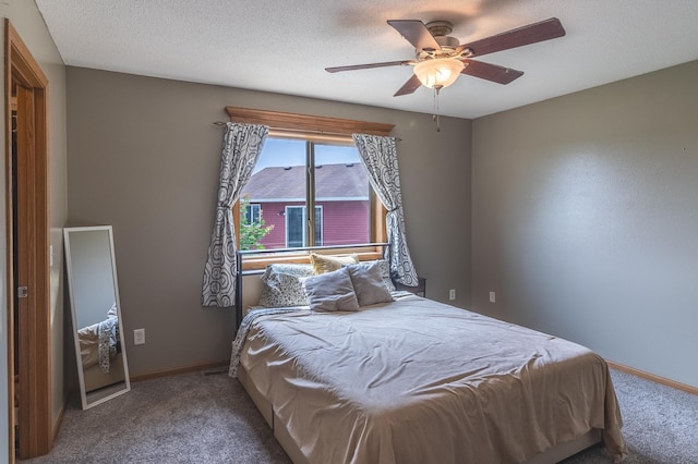 250 18th Ave SE, Saint Joseph, MN 56374 - carpeted bedroom featuring baseboards and ceiling fan