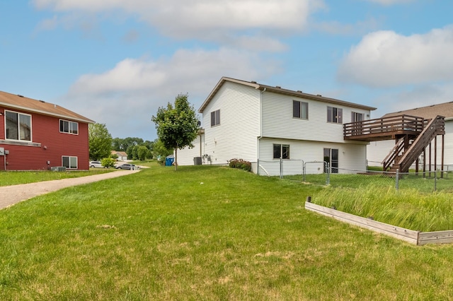 250 18th Ave SE, Saint Joseph, MN 56374 - view of yard with a wooden deck