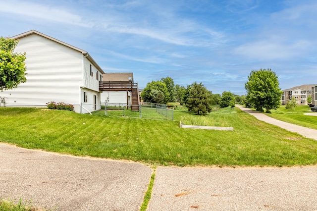 250 18th Ave SE, Saint Joseph, MN 56374 - view of yard featuring a wooden deck