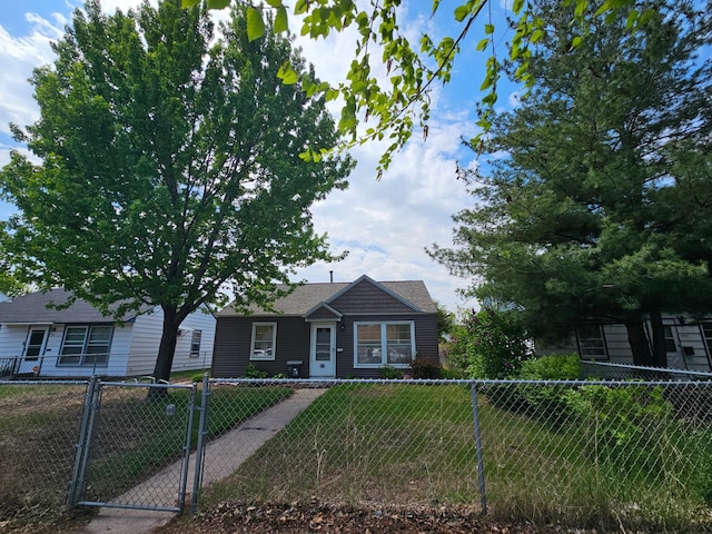4921 Fremont Ave N, Minneapolis, MN 55430 - bungalow-style home featuring a gate