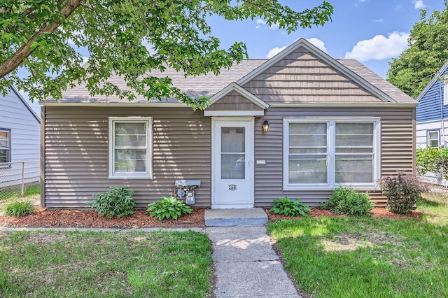 4921 Fremont Ave N, Minneapolis, MN 55430 - view of front of home featuring a shingled roof