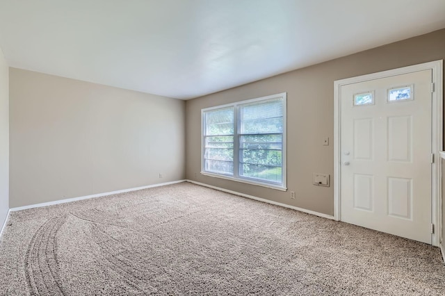 4921 Fremont Ave N, Minneapolis, MN 55430 - foyer entrance with carpet floors and baseboards