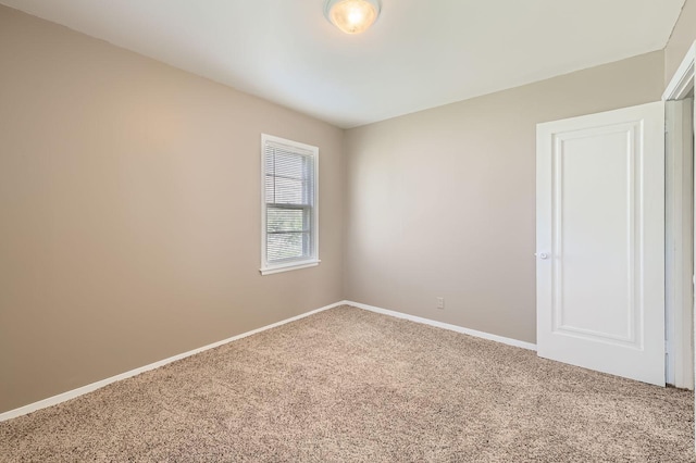 4921 Fremont Ave N, Minneapolis, MN 55430 - carpeted empty room with baseboards