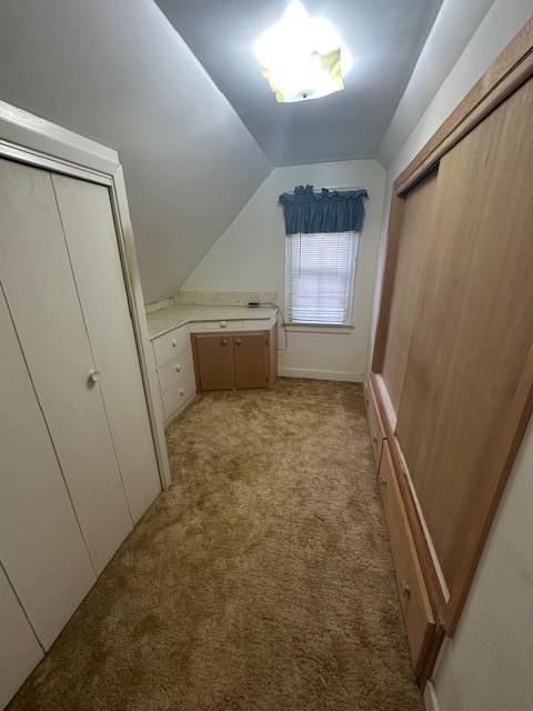 700 Oakland Pl NE, Austin, MN 55912 - bathroom with vaulted ceiling