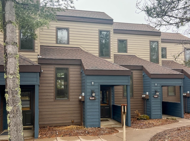 529 Moose Mountain Dr, Lutsen Twp, MN 55615 - view of front of house with roof with shingles