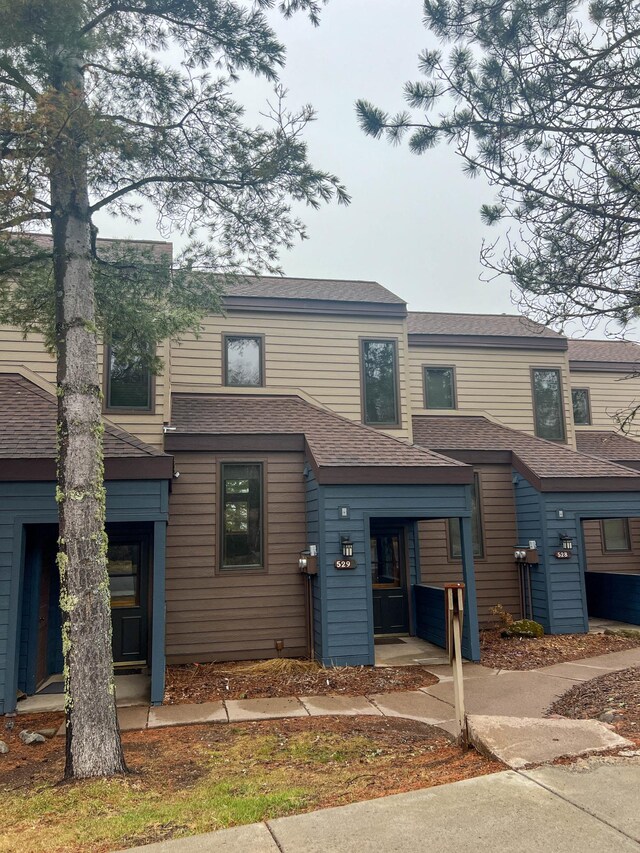 529 Moose Mountain Dr, Lutsen Twp, MN 55615 - view of front of property featuring a shingled roof
