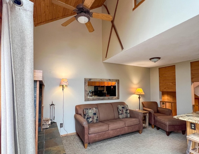 529 Moose Mountain Dr, Lutsen Twp, MN 55615 - living area with a ceiling fan, high vaulted ceiling, wooden ceiling, and stone finish flooring