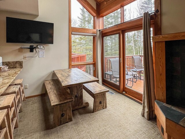 529 Moose Mountain Dr, Lutsen Twp, MN 55615 - dining area with light colored carpet and baseboards