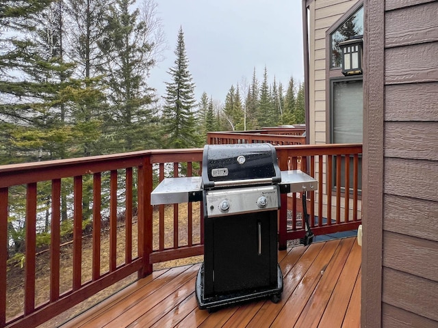 529 Moose Mountain Dr, Lutsen Twp, MN 55615 - wooden deck with area for grilling