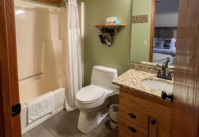 529 Moose Mountain Dr, Lutsen Twp, MN 55615 - bathroom with vanity, toilet, shower / tub combo, and tile patterned floors