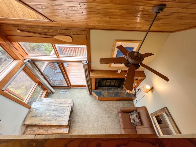 529 Moose Mountain Dr, Lutsen Twp, MN 55615 - living room with wooden ceiling, a ceiling fan, and carpet floors