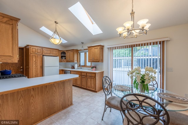 2226 Whispering Trl, Eagan, MN 55122 - kitchen with freestanding refrigerator, a skylight, vaulted ceiling, brown cabinetry, and light countertops