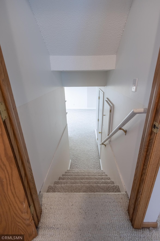 2226 Whispering Trl, Eagan, MN 55122 - stairs featuring carpet flooring and a textured ceiling