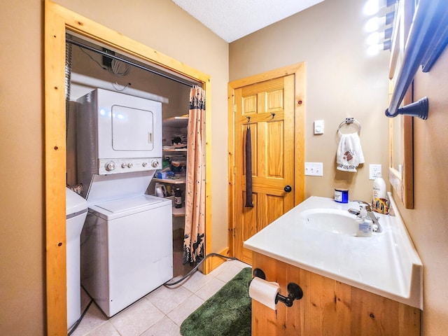 10547 Vermeil Dr NE, Deer River, MN 56636 - laundry room with stacked washer / drying machine and light tile patterned floors