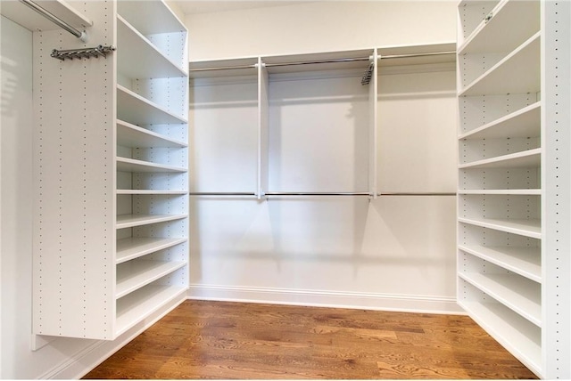 TBB403 College St, Northfield, MN 55057 - walk in closet featuring wood finished floors
