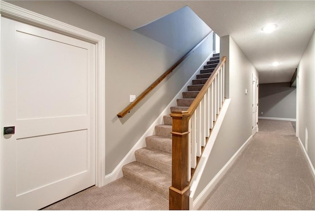 TBB403 College St, Northfield, MN 55057 - staircase with carpet flooring, baseboards, and recessed lighting