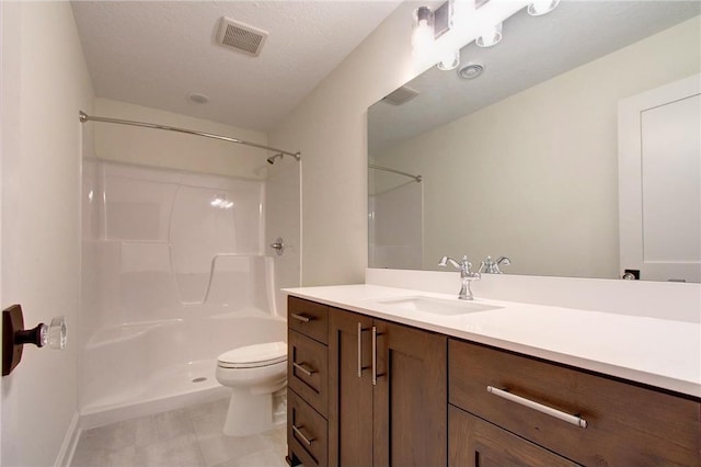 TBB403 College St, Northfield, MN 55057 - full bath featuring vanity, toilet, baseboards, and tile patterned flooring