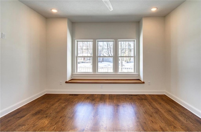 TBB403 College St, Northfield, MN 55057 - spare room with baseboards, wood finished floors, and recessed lighting
