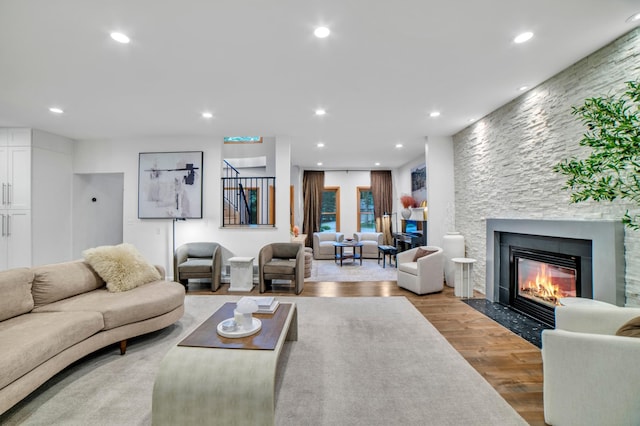 11260 Hidden Oaks Ct N, Champlin, MN 55316 - living room featuring recessed lighting, a fireplace, and wood finished floors