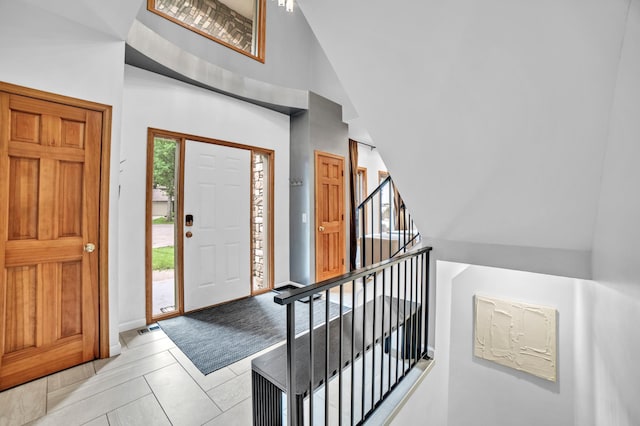 11260 Hidden Oaks Ct N, Champlin, MN 55316 - entryway with stairs, baseboards, and a high ceiling
