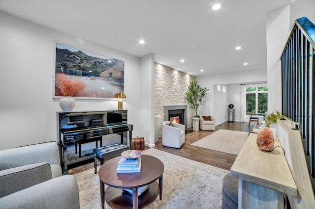 11260 Hidden Oaks Ct N, Champlin, MN 55316 - living area with wood finished floors, recessed lighting, and a fireplace