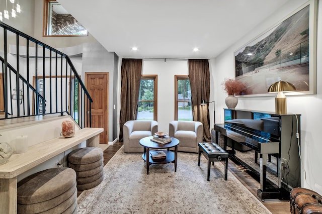 11260 Hidden Oaks Ct N, Champlin, MN 55316 - living area with wood finished floors, stairs, and recessed lighting